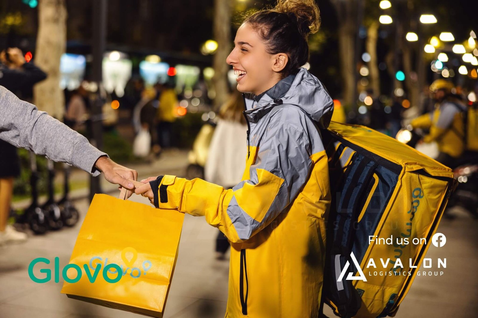 glovo delivery rider delivering groceries at night