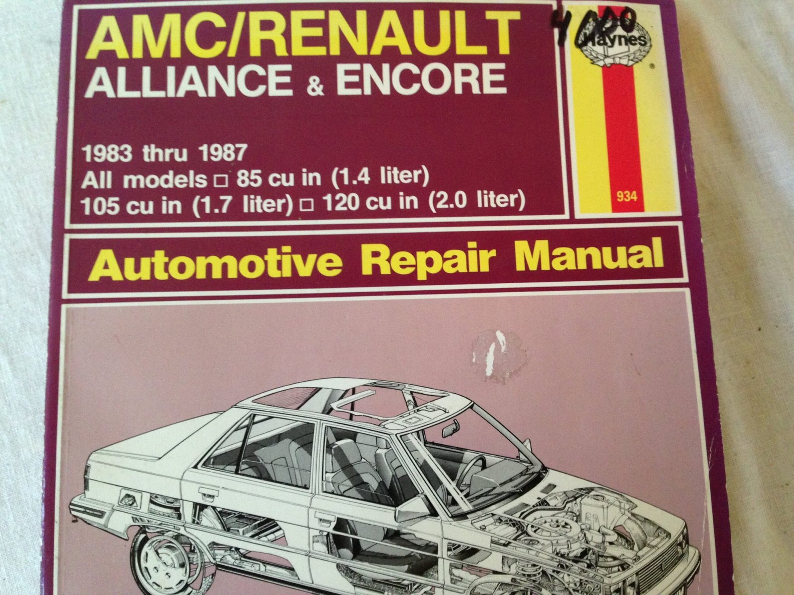 libro de reparacion de automoviles en accion scaled