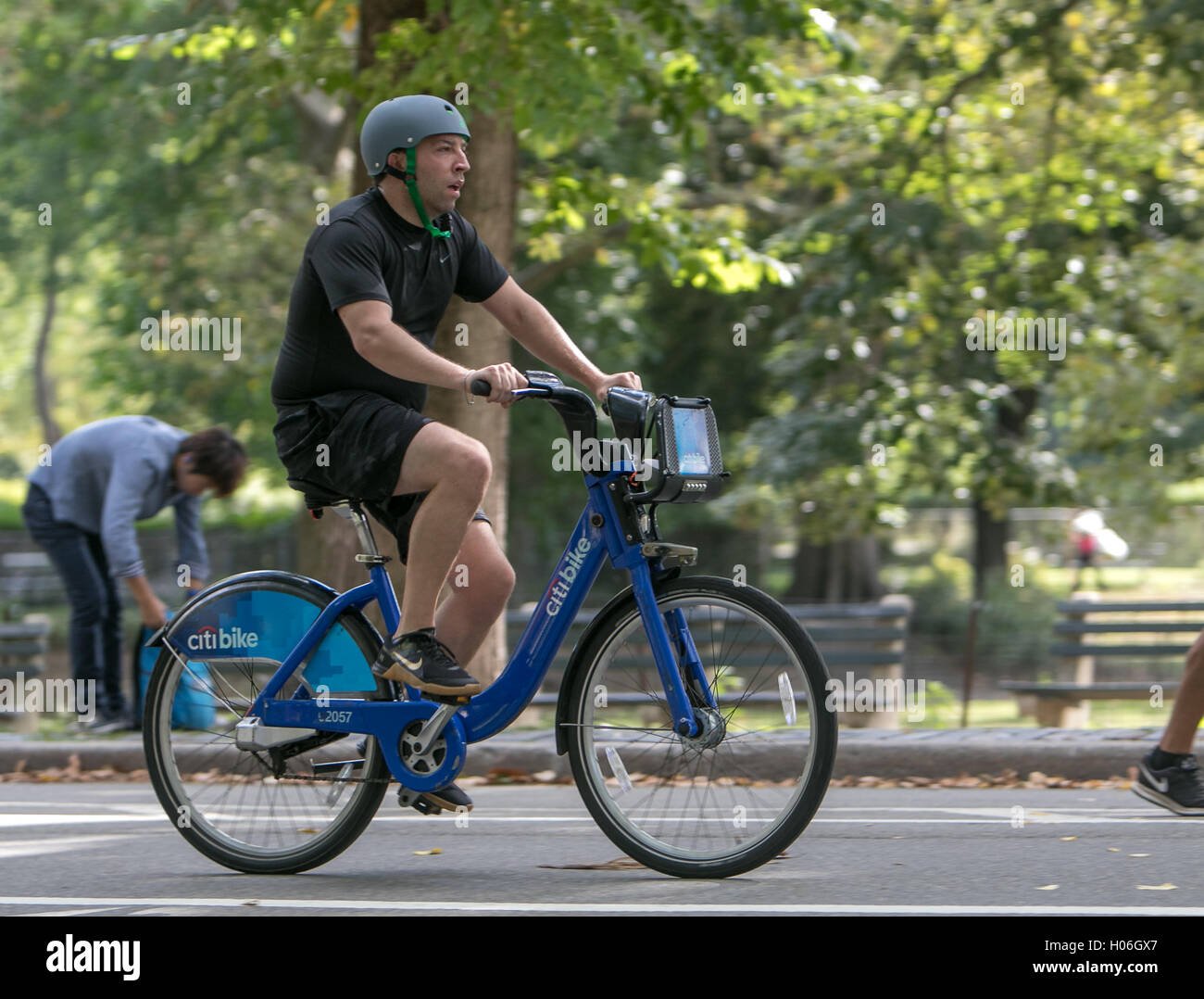 person riding a bicycle in central park